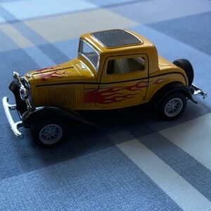 Yellow Toy Car with Flames
